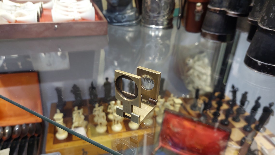 Antique pocket bronze magnifier.Lupe early 20th century