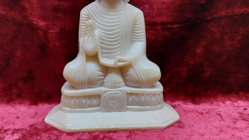 stone buddha figurine