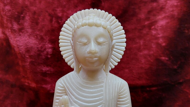 stone buddha figurine