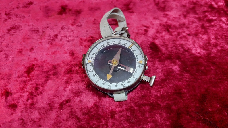 Old vintage wrist compass of the Soviet Army from the 1970s Adrianov
