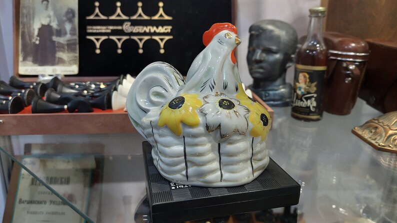 Ukrainian rooster with sunflowers. Porcelain figurine
