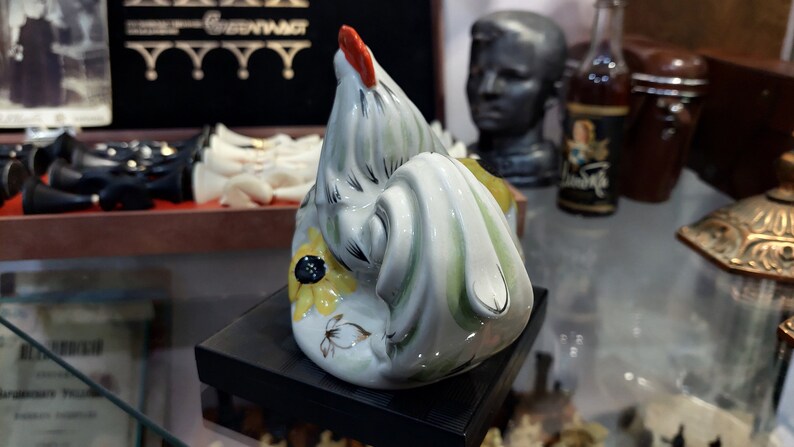 Ukrainian rooster with sunflowers. Porcelain figurine