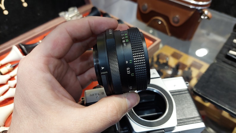 The Praktica MTL5b 35mm SLR is a 29mm f/2.8 wide angle lens.