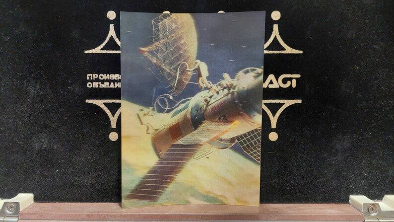Postcard 3d. Astronauts in outer space. Orbital complex Salyut-Soyuz