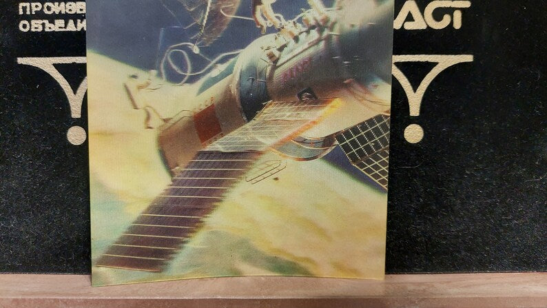 Postcard 3d. Astronauts in outer space. Orbital complex Salyut-Soyuz