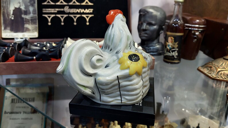 Ukrainian rooster with sunflowers. Porcelain figurine