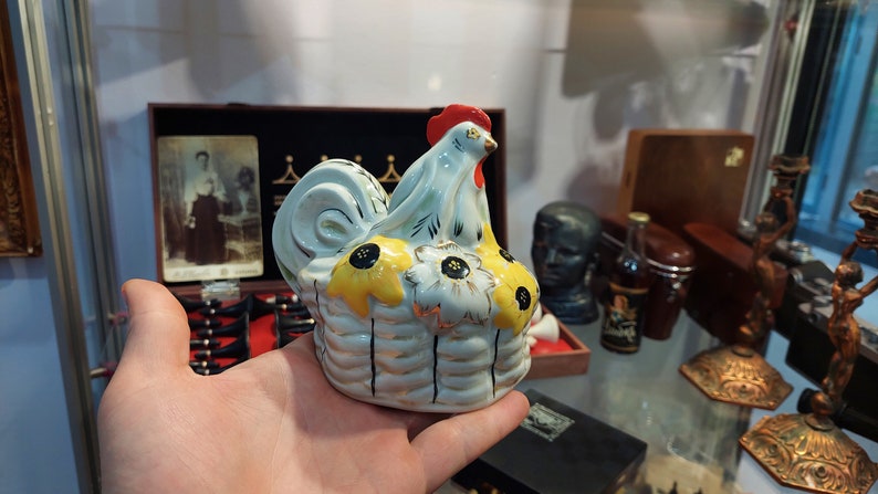 Ukrainian rooster with sunflowers. Porcelain figurine