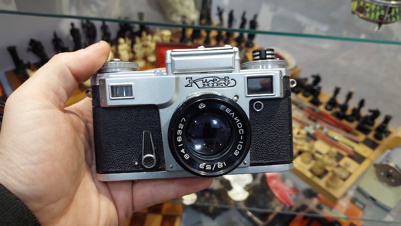 Vintage Camera Kiev with a Helios 103 1.8 / 53 lens in a leather case