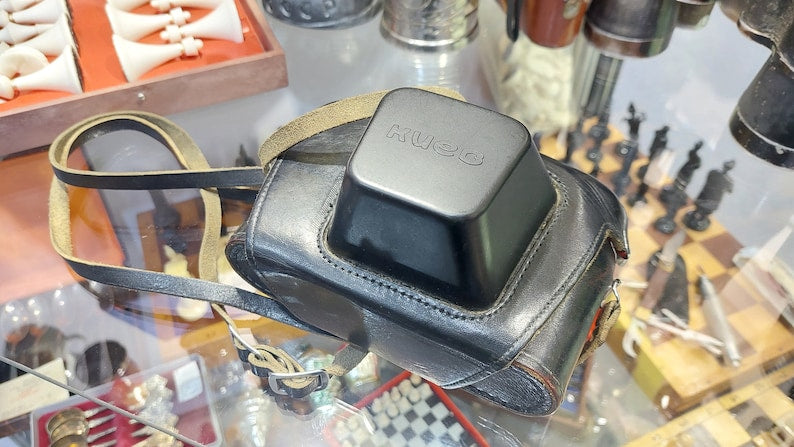 Vintage Camera Kiev with a Helios 103 1.8 / 53 lens in a leather case