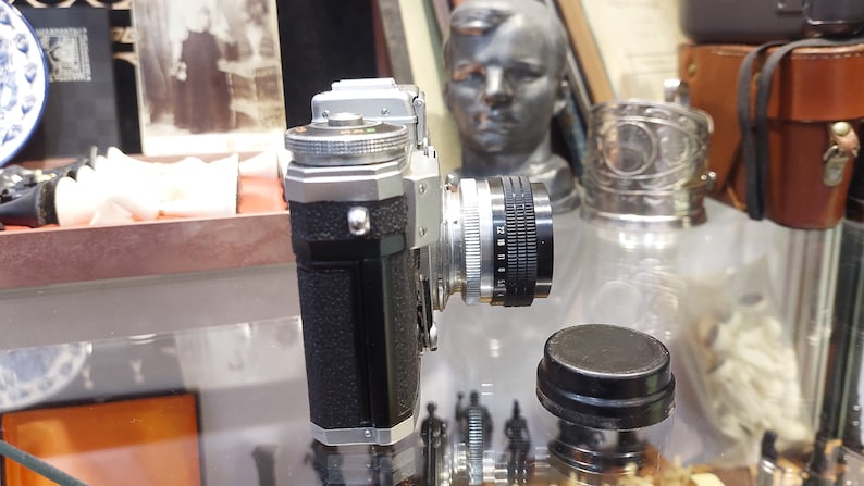 Vintage Camera Kiev with a Helios 103 1.8 / 53 lens in a leather case