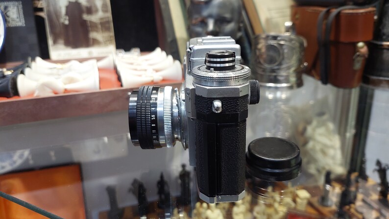 Vintage Camera Kiev with a Helios 103 1.8 / 53 lens in a leather case