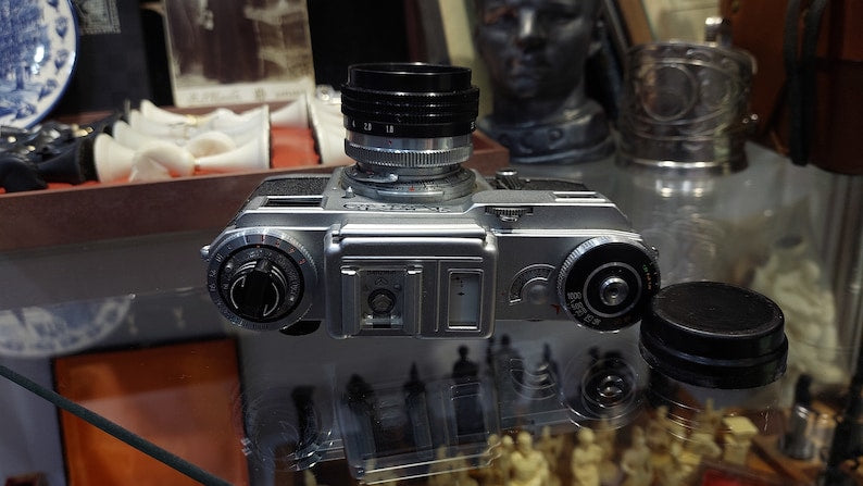 Vintage Camera Kiev with a Helios 103 1.8 / 53 lens in a leather case