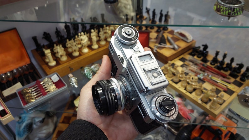Vintage Camera Kiev with a Helios 103 1.8 / 53 lens in a leather case