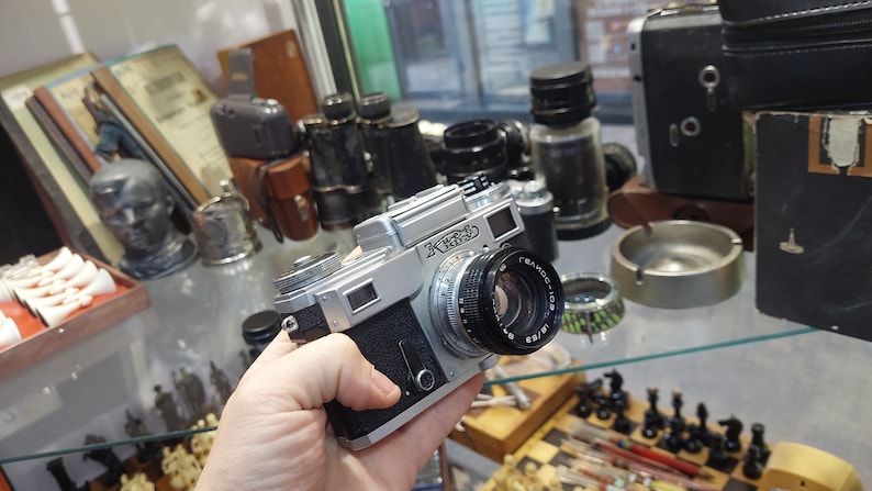 Vintage Camera Kiev with a Helios 103 1.8 / 53 lens in a leather case