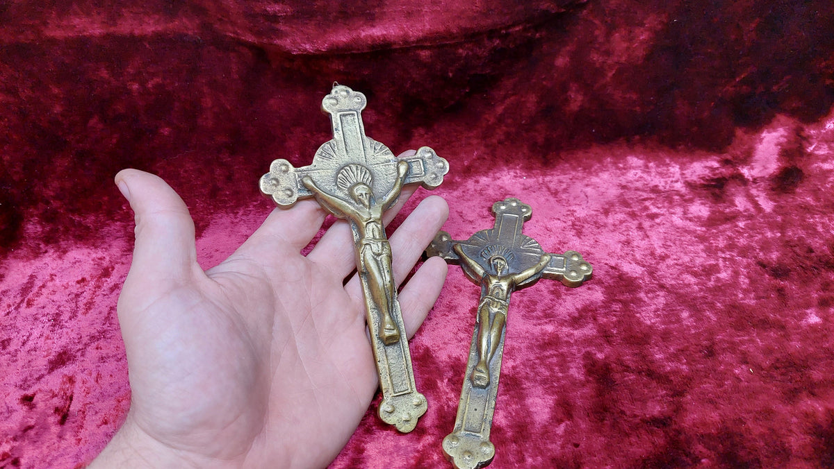 2 brass Catholic crosses