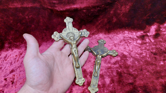 2 brass Catholic crosses