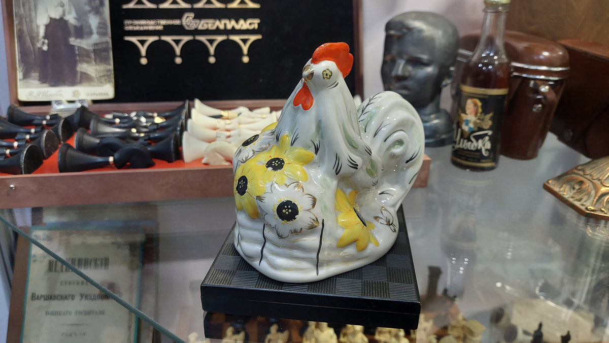 Ukrainian rooster with sunflowers. Porcelain figurine