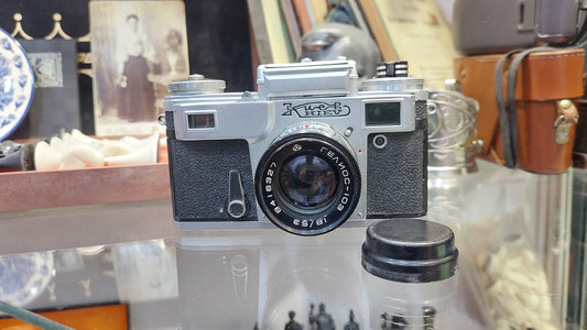 Vintage Camera Kiev with a Helios 103 1.8 / 53 lens in a leather case